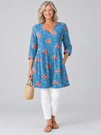 Rosella long blouse with V-neck in denim blue rose print, front view
