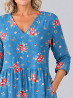 Rosella long blouse close up of rose print, V-neck and pocket