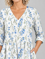 Cornelia long blouse in white with cornflower blue wildflower print, close up of print and neckline