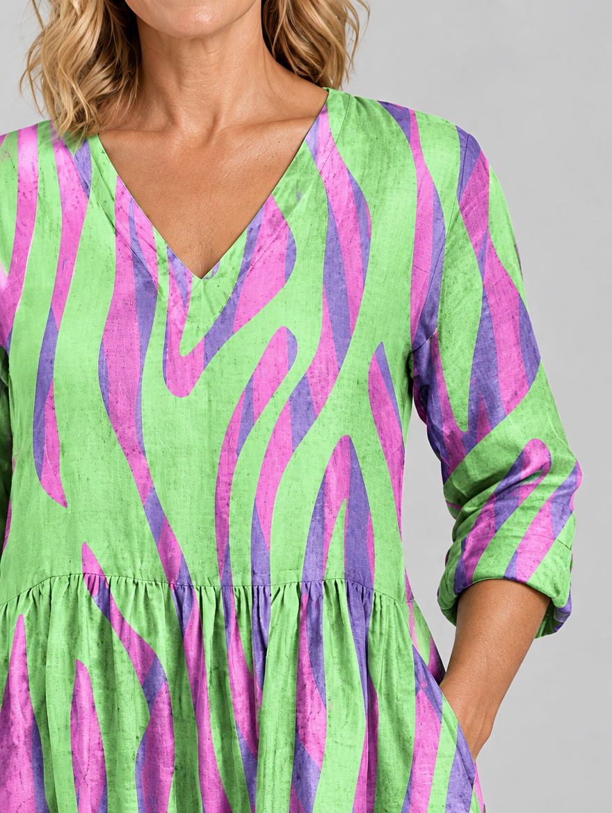 Lyla long blouse in lime green wave print, close up of print and neckline
