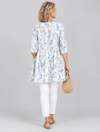 Cornelia long blouse in white with cornflower blue wildflower print, back view