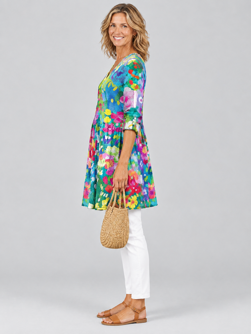 Claudette long blouse in impressionist garden print, side view showing the relaxed fit