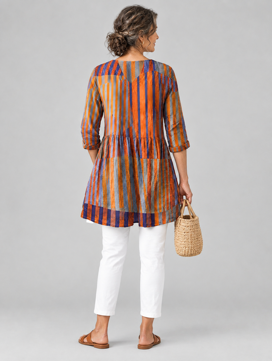 Ardith long blouse in burnt orange and violet painted stripe print, back view