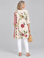 Hedda long blouse in beige folk floral print, back view