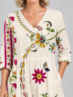 Hedda long blouse in beige folk floral print, close up of print and neckline
