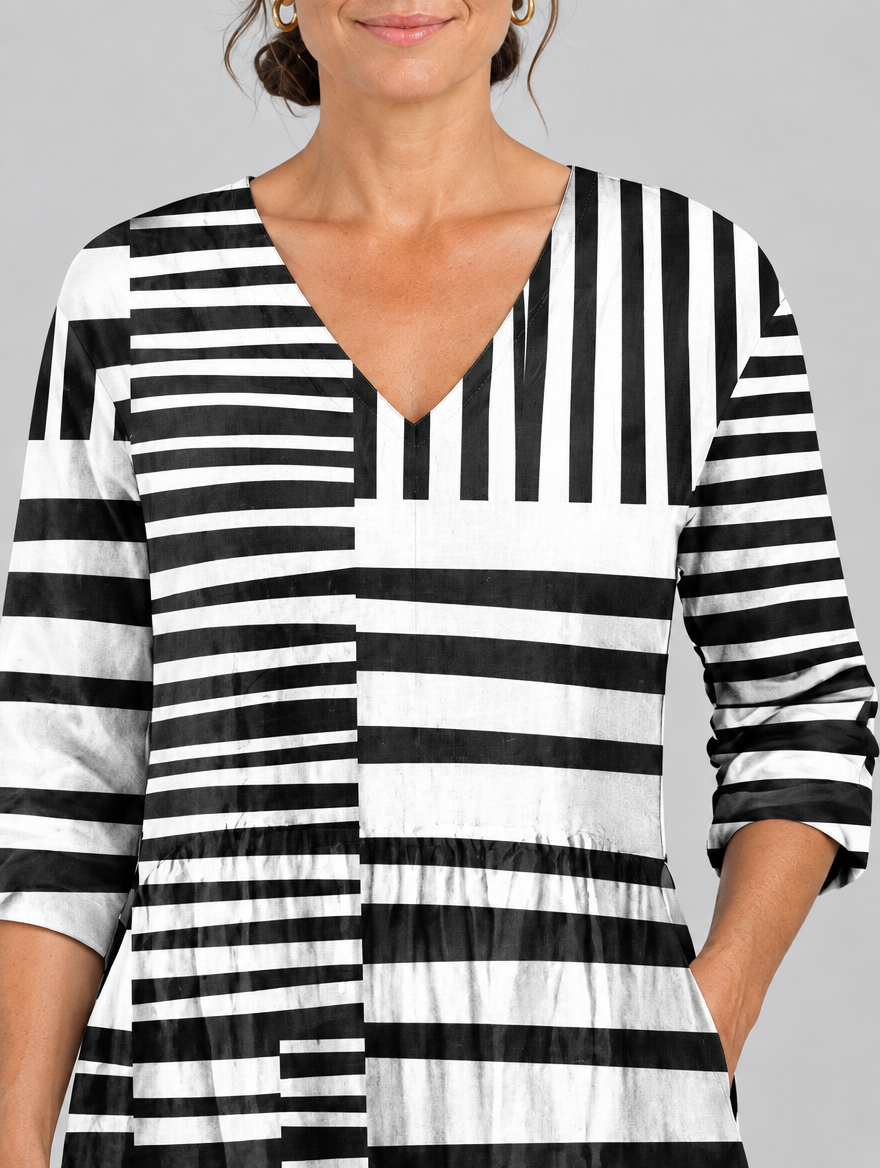 Sienna long blouse in black and white block stripe print, close up of print and neckline