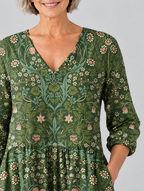 Wilda long blouse in forest green botanical print, close up of print and neckline