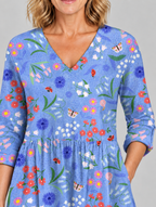 Cendrine long blouse in periwinkle garden print, close up of print and neckline
