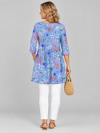 Cendrine long blouse in periwinkle garden print, back view