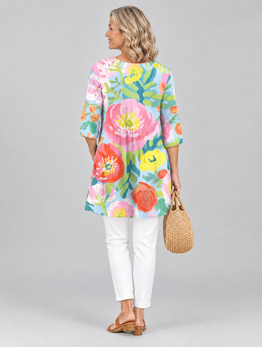 Florinda long blouse in pastel watercolour poppy print on sky blue, back view