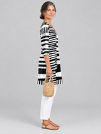 Vivica long blouse in black and white block stripe print, side view showing the relaxed fit