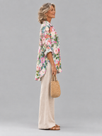 Camellia relaxed tunic in painterly camellia and rose print, side view showing the relaxed fit