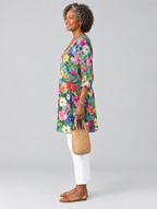 Lark long blouse in teal wildflower print, side view showing the relaxed fit