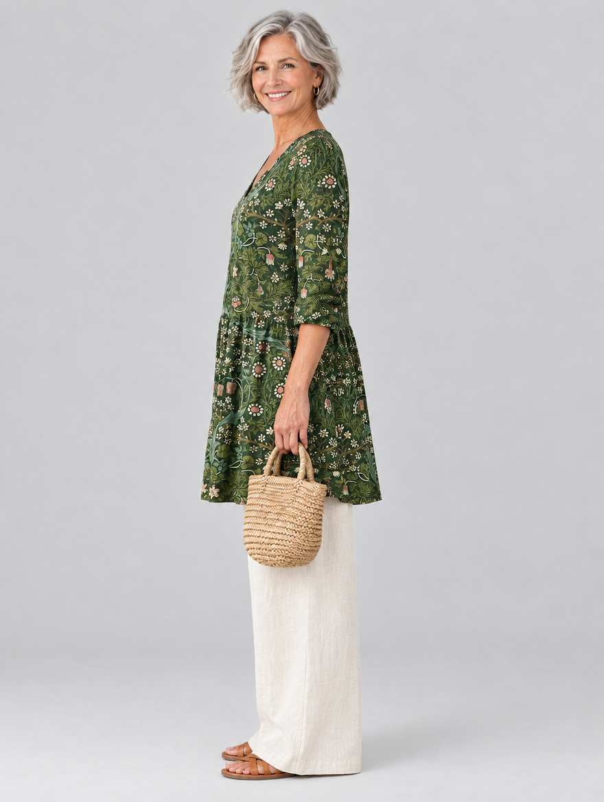 Wilda long blouse in forest green botanical print, side view showing the relaxed fit