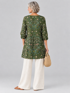 Wilda long blouse in forest green botanical print, back view