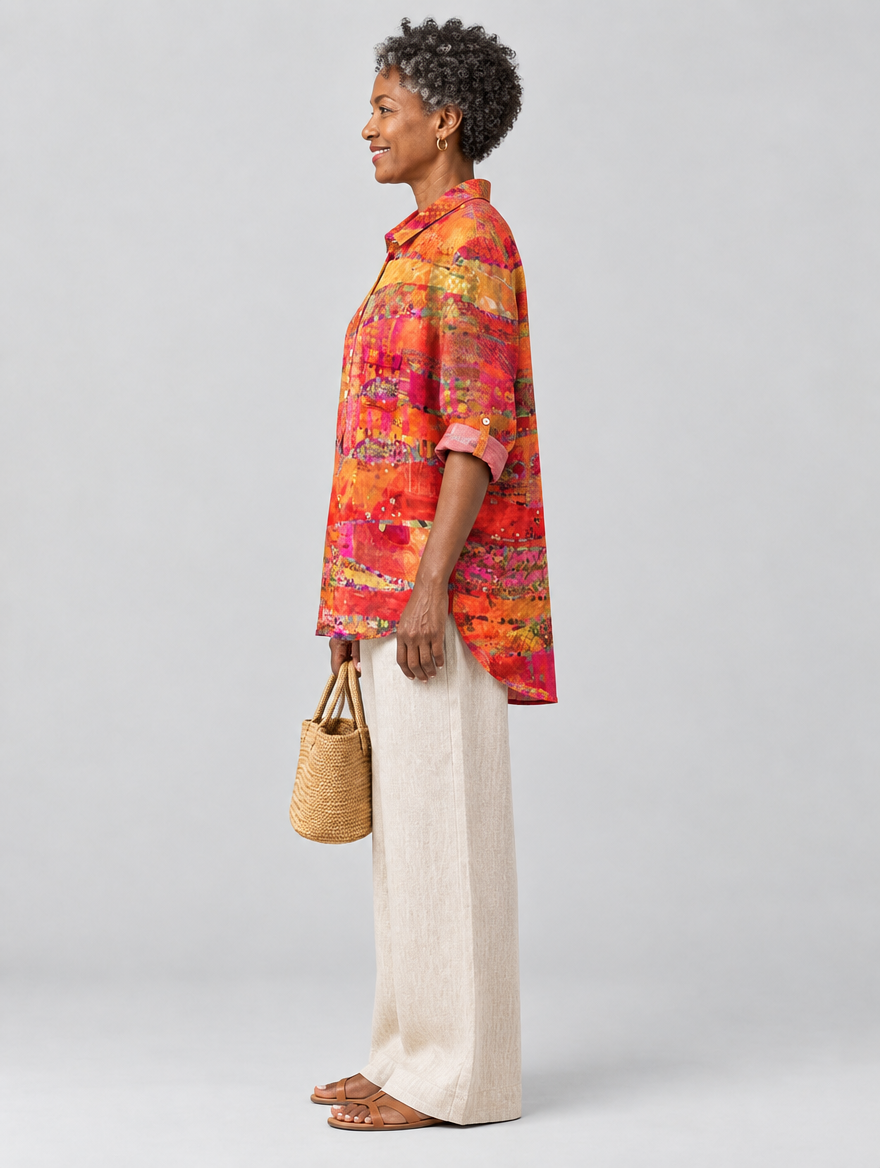 Una relaxed tunic in sunset collage print, side view showing the relaxed fit
