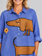 Brynja relaxed tunic in periwinkle blue sausage dog print, close up of print and collar