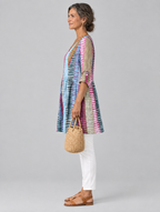 Yvaine long blouse in painted brush stripe print, side view showing the relaxed fit