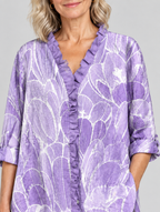 Velda relaxed tunic in lavender petal print, close up of print and ruffle neckline