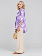 Velda relaxed tunic in lavender petal print, side view showing the relaxed fit