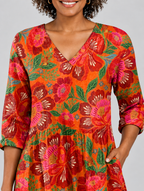 Marcy long blouse in tangerine and red floral print, close up of print and neckline