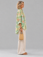 Mei relaxed tunic in mint chinoiserie peony print, side view showing the relaxed fit