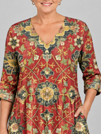 Cosima long blouse in brick red medallion tapestry print, close up of print and neckline