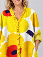 Daffodil relaxed tunic in sunflower yellow retro poppy print, close up of print and ruffle neckline