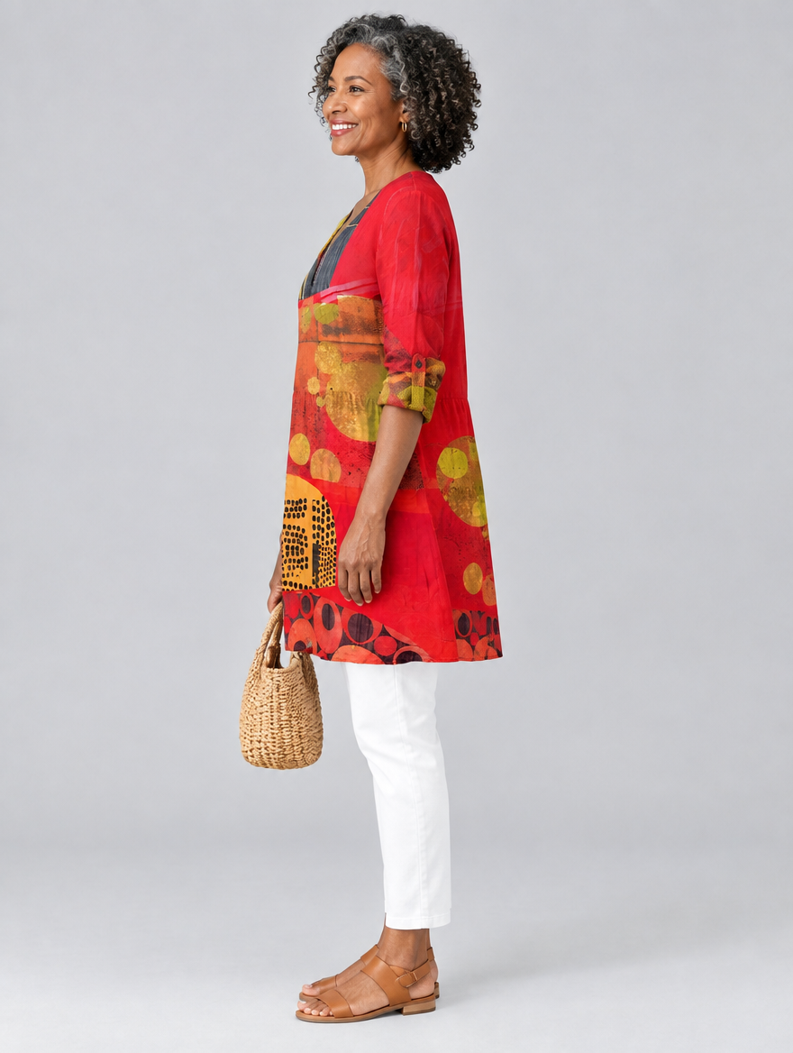 Zelie long blouse in tomato red art collage print, side view showing the relaxed fit