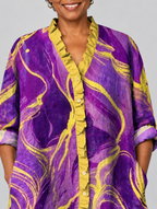 Regina relaxed tunic in violet and gold marble print, close up of print and ruffle neckline