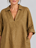 Tawny relaxed linen tunic in khaki, close up of fabric and neckline