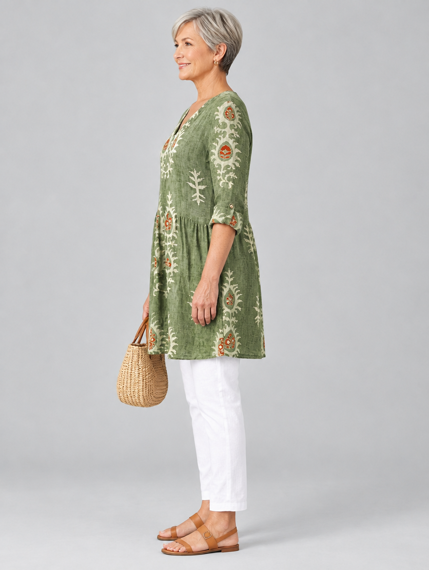 Sylvana long blouse in sage green botanical print, side view showing the relaxed fit
