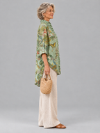 Pamina relaxed tunic in sage peacock and poppy print, side view showing the relaxed fit