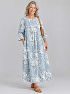 Rosaline printed maxi dress in blue with raised white floral print, front view