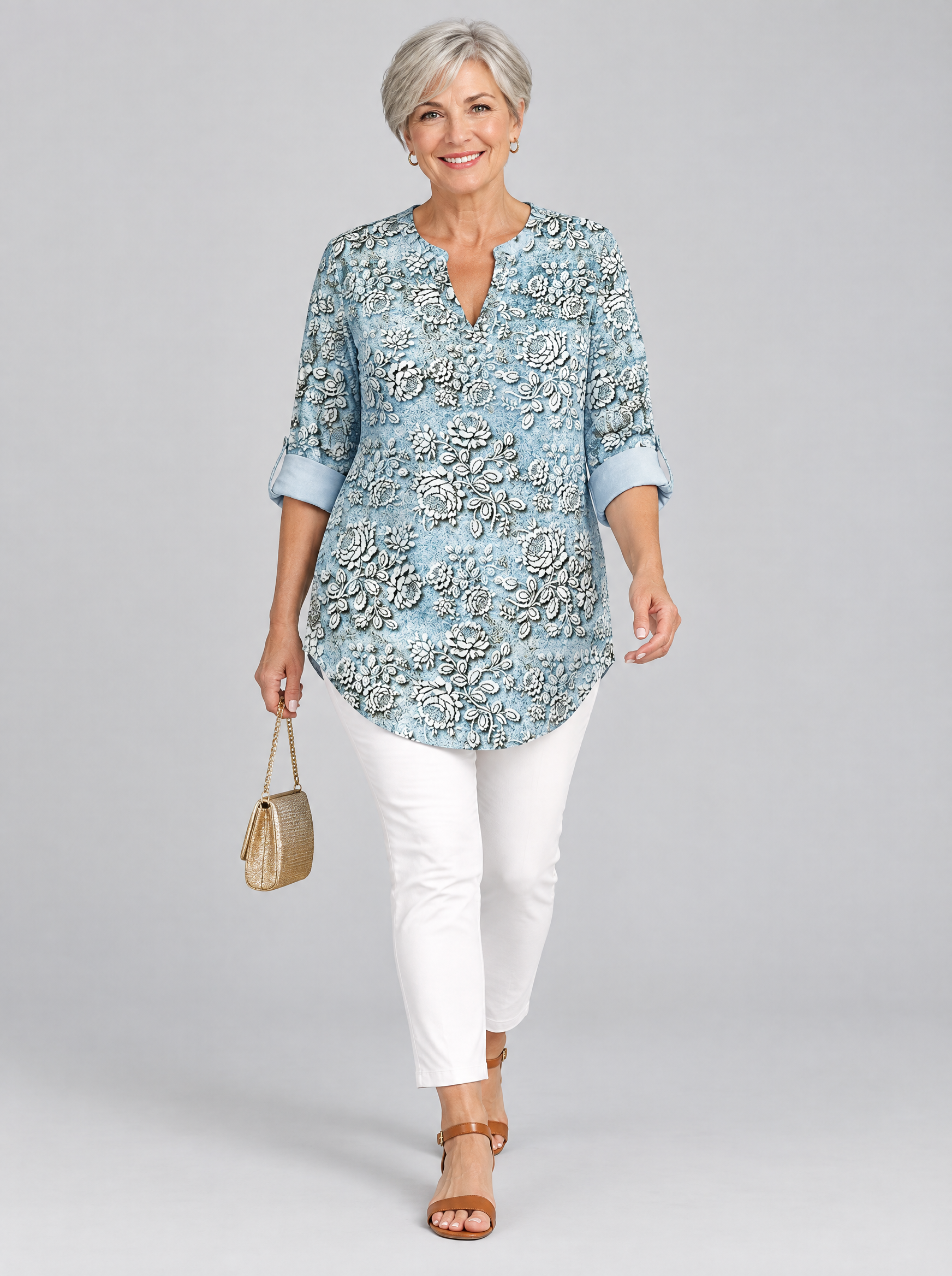 Aria printed tunic top in light blue with embossed rose print, front view