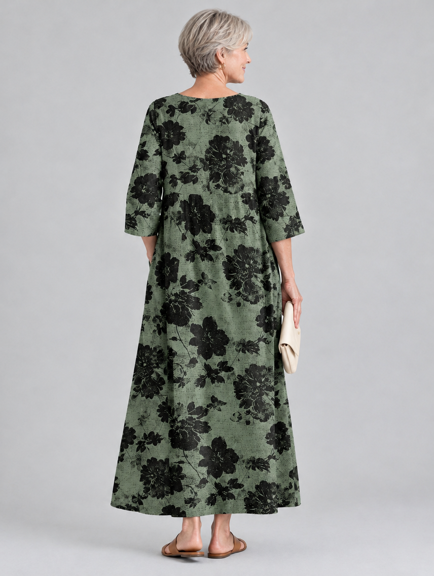 Kassia printed maxi dress in sage green with black floral print, back view
