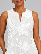 Valetta sleeveless maxi dress in white with tonal floral print, close up of print and neckline