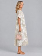 Hesper midi dress in khaki with soft white floral print, side view