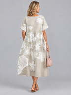 Hesper midi dress in khaki with soft white floral print, back view