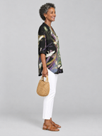 Orla printed shirt in black with crane and blossom print, side view