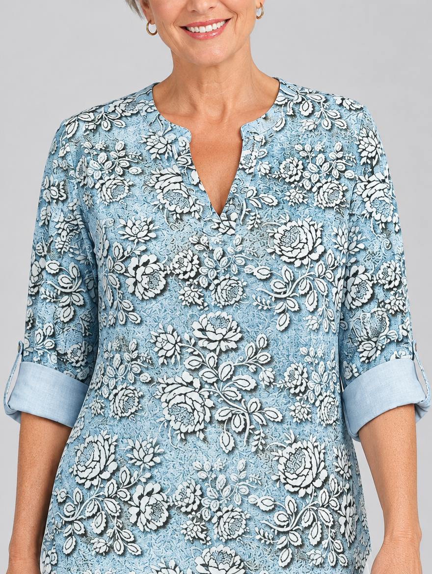 Aria printed tunic top in light blue with embossed rose print, close up of print and neckline