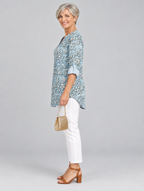 Isaura printed tunic top in light blue with embossed rose print, side view