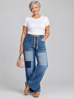 Rosita patchwork drawstring jeans in mid blue denim, front view