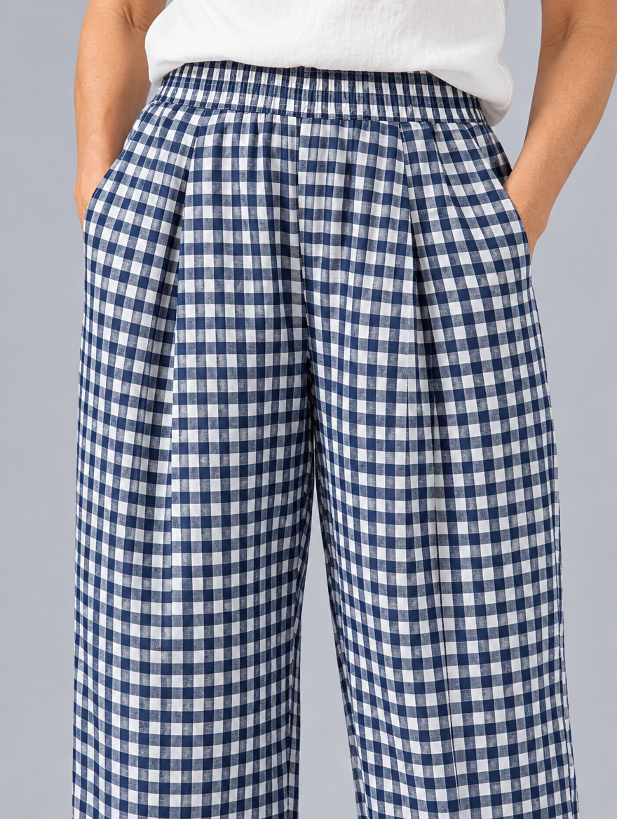 Caro gingham trousers in navy check, close up of elastic waistband, pleats and fabric