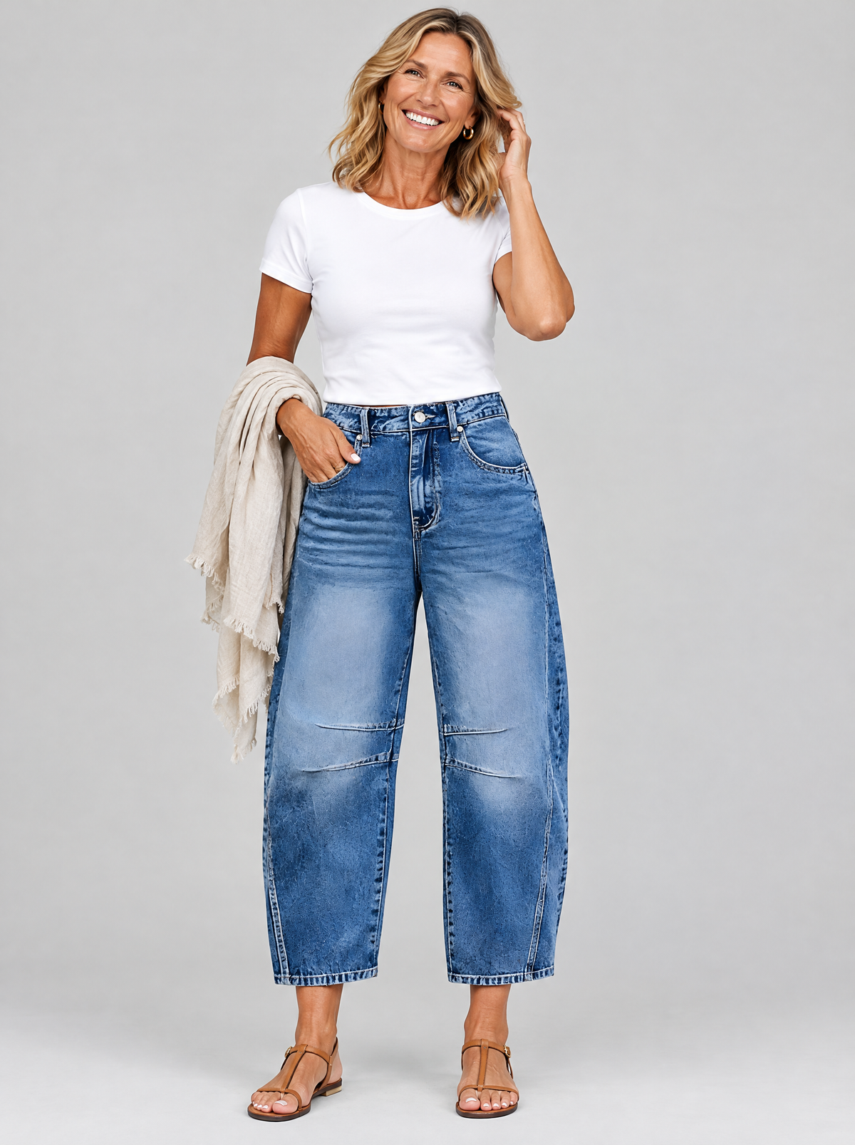 Farrah casual jeans in mid blue wash with curved barrel leg, front view