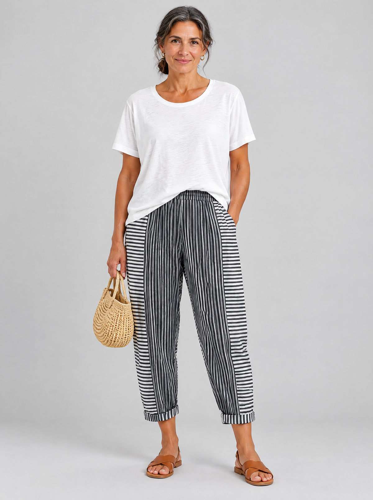 Saffy relaxed fit trousers in black and white stripe, front view