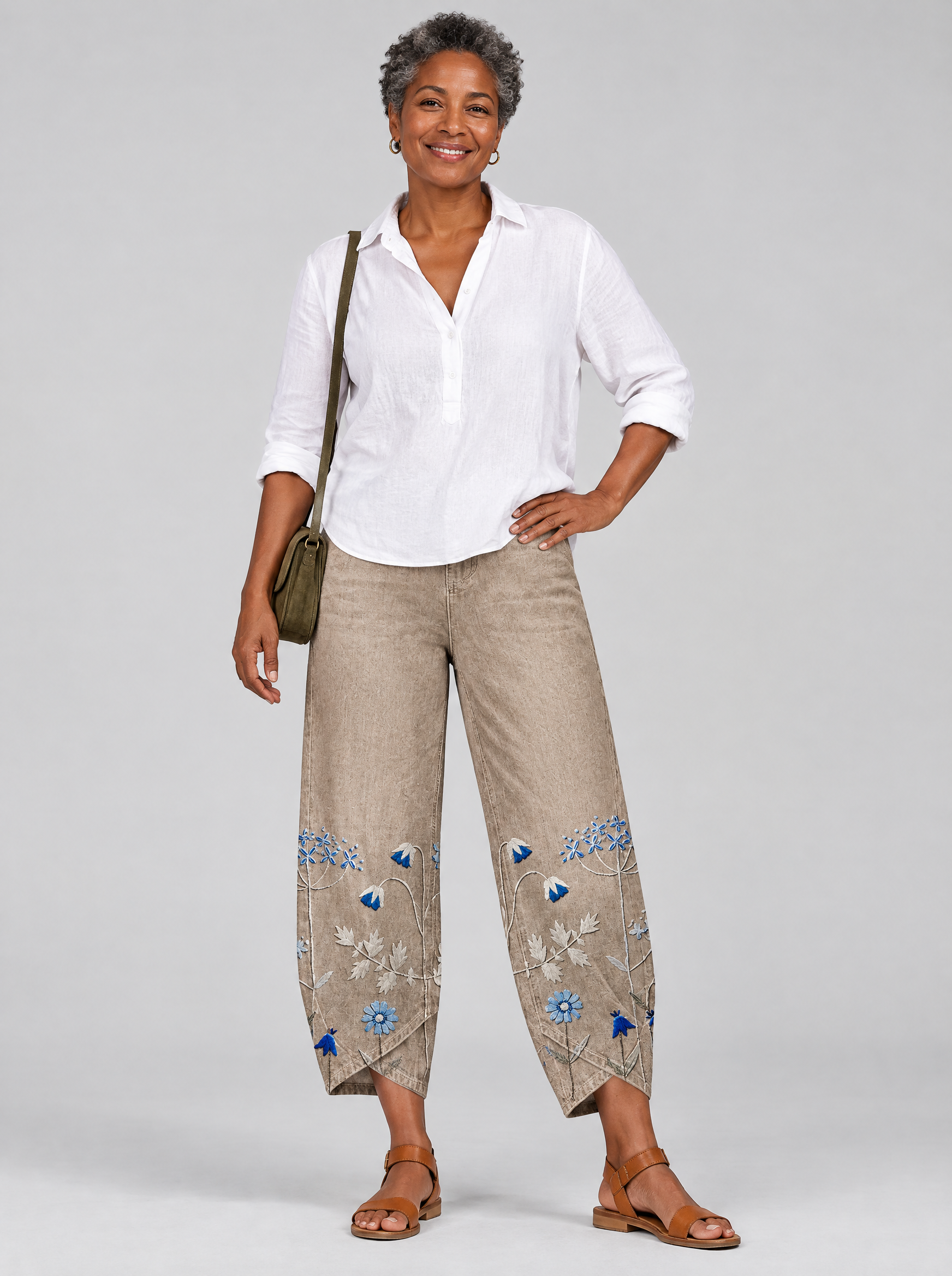 Everlee floral pattern comfort pants in khaki with blue flower print, front view