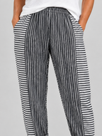 Saffy relaxed fit trousers in black stripe, close up of waistband, side panels and fabric