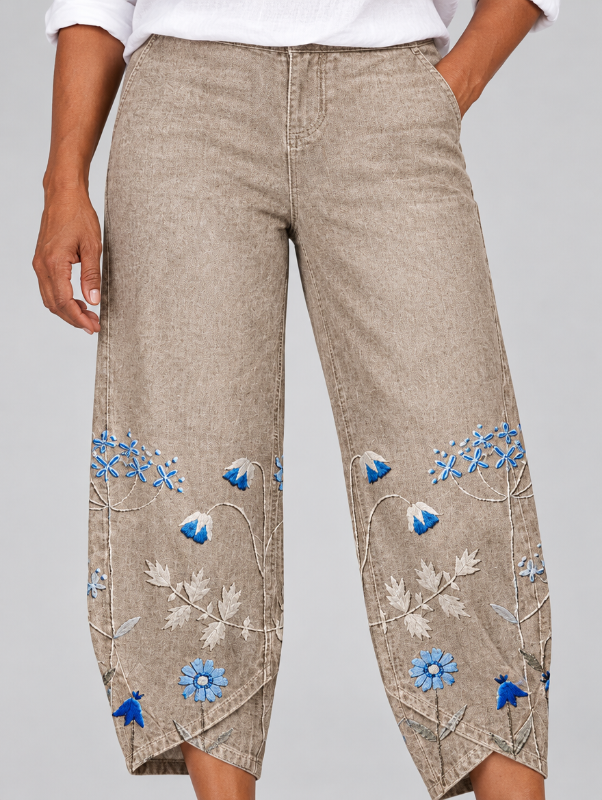 Petunia floral comfort pants in khaki, close up of flower print and tulip hem