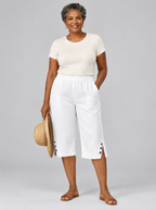 Neva lightweight comfort shorts in white with button side slits, front view